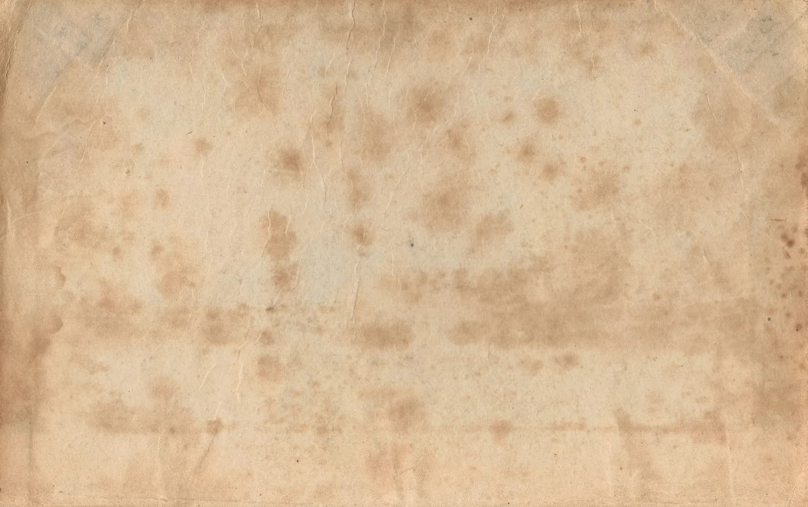 Aged ledger paper with natural creases and warm staining